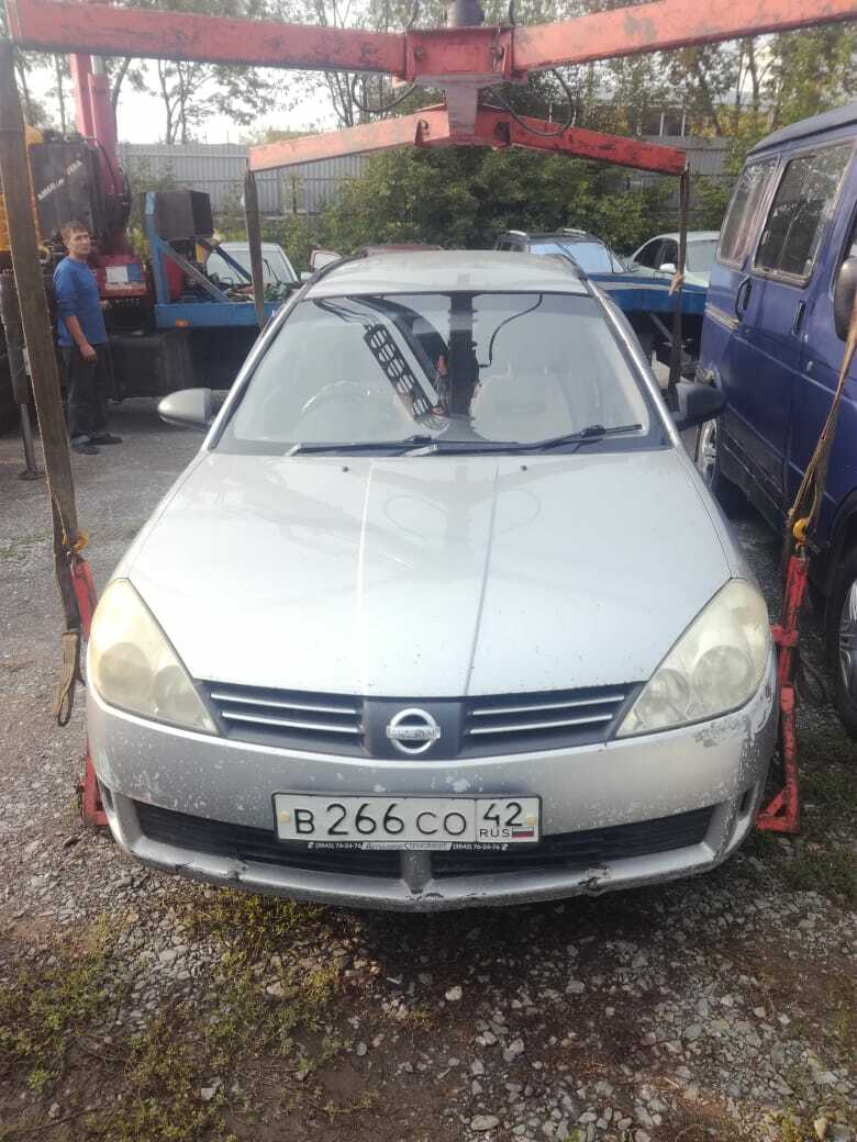 Фото вертикальной погрузки стрелой манипулятора